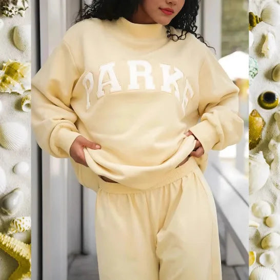 Izzy | Women's Oversized Mock Neck Sweater with Varsity Graphic